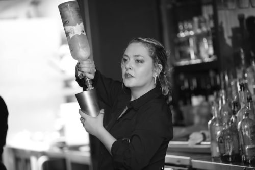 A bartender prepares drinks at Crawdaddy's Restaurant in Visalia